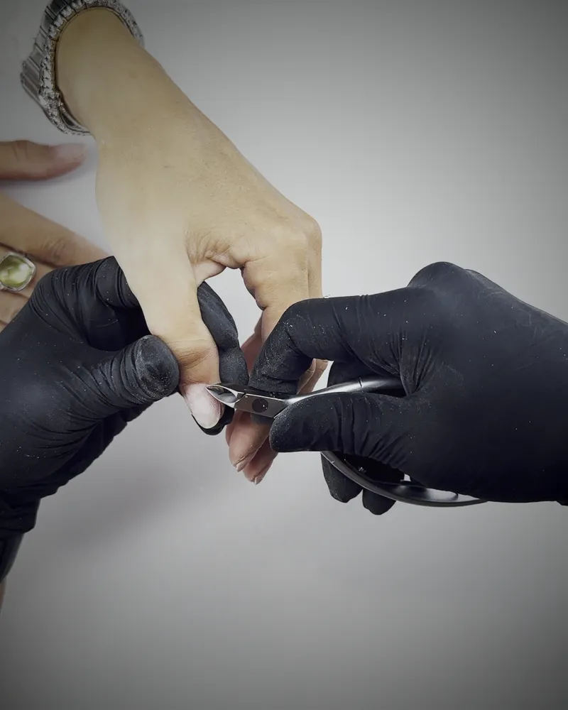 Cuticle nippers at work, close up
